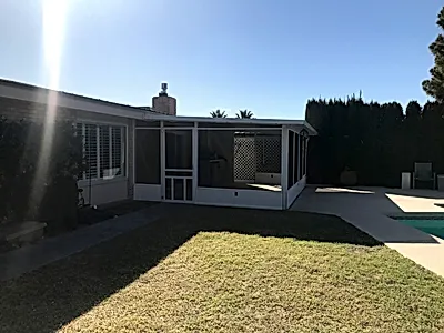 Finished enclosed patio with complete roof and walls