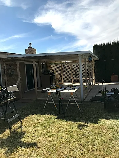 Patio frame before enclosure — bare framing stage